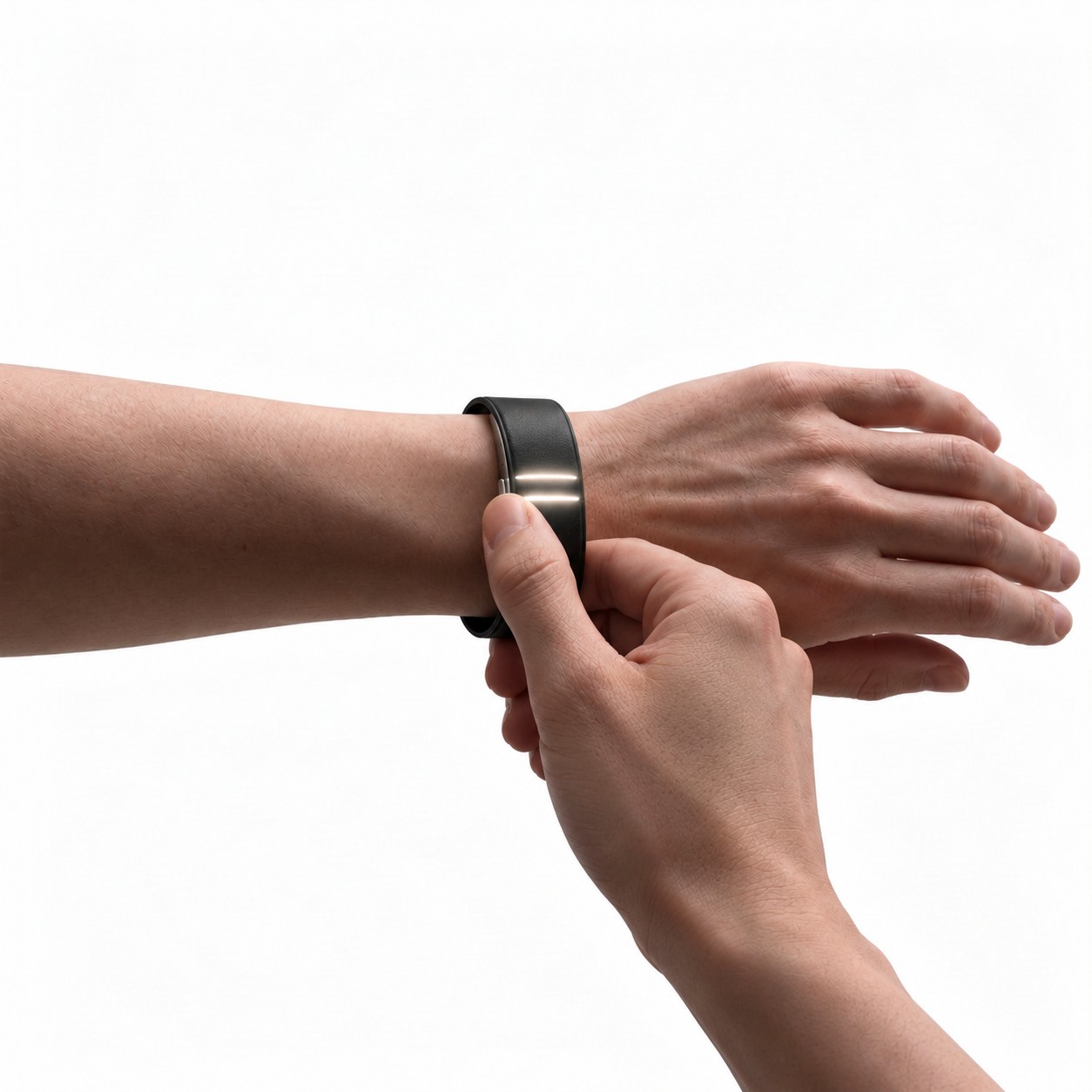 A hand flipping the toggle on a Moonband worn on the wrist